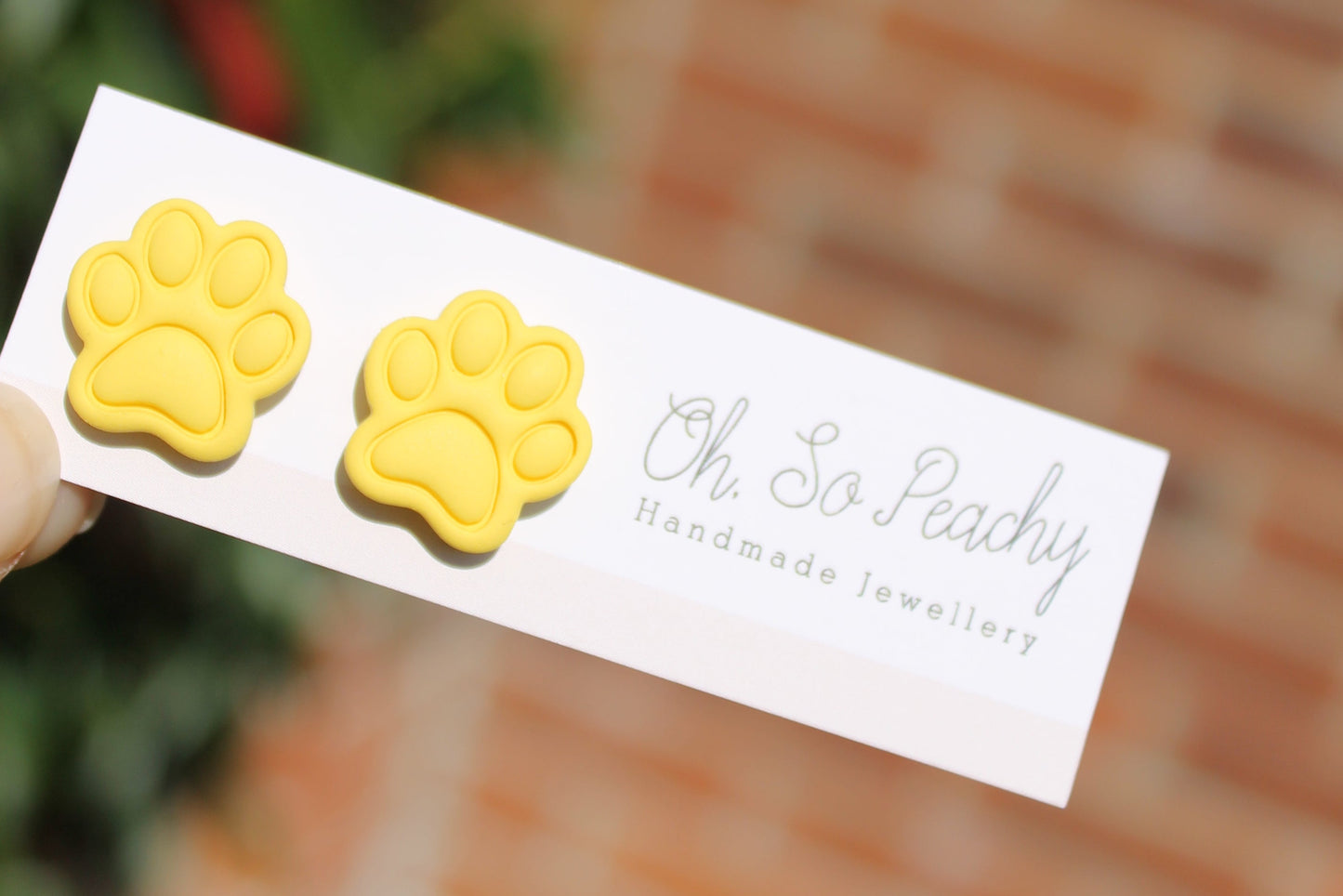 Polymer Clay Paw Print Stud Earrings yellow