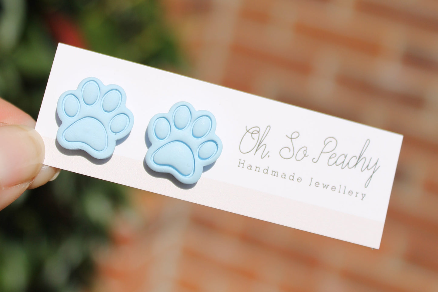 Polymer Clay Paw Print Stud Earrings blue
