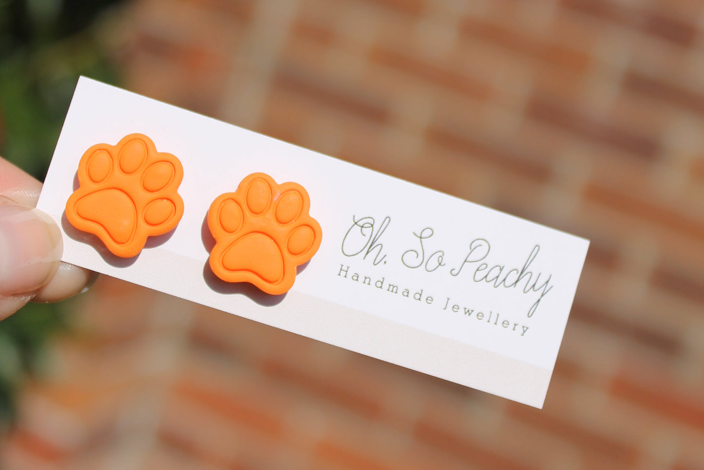 Polymer Clay Paw Print Stud Earrings orange