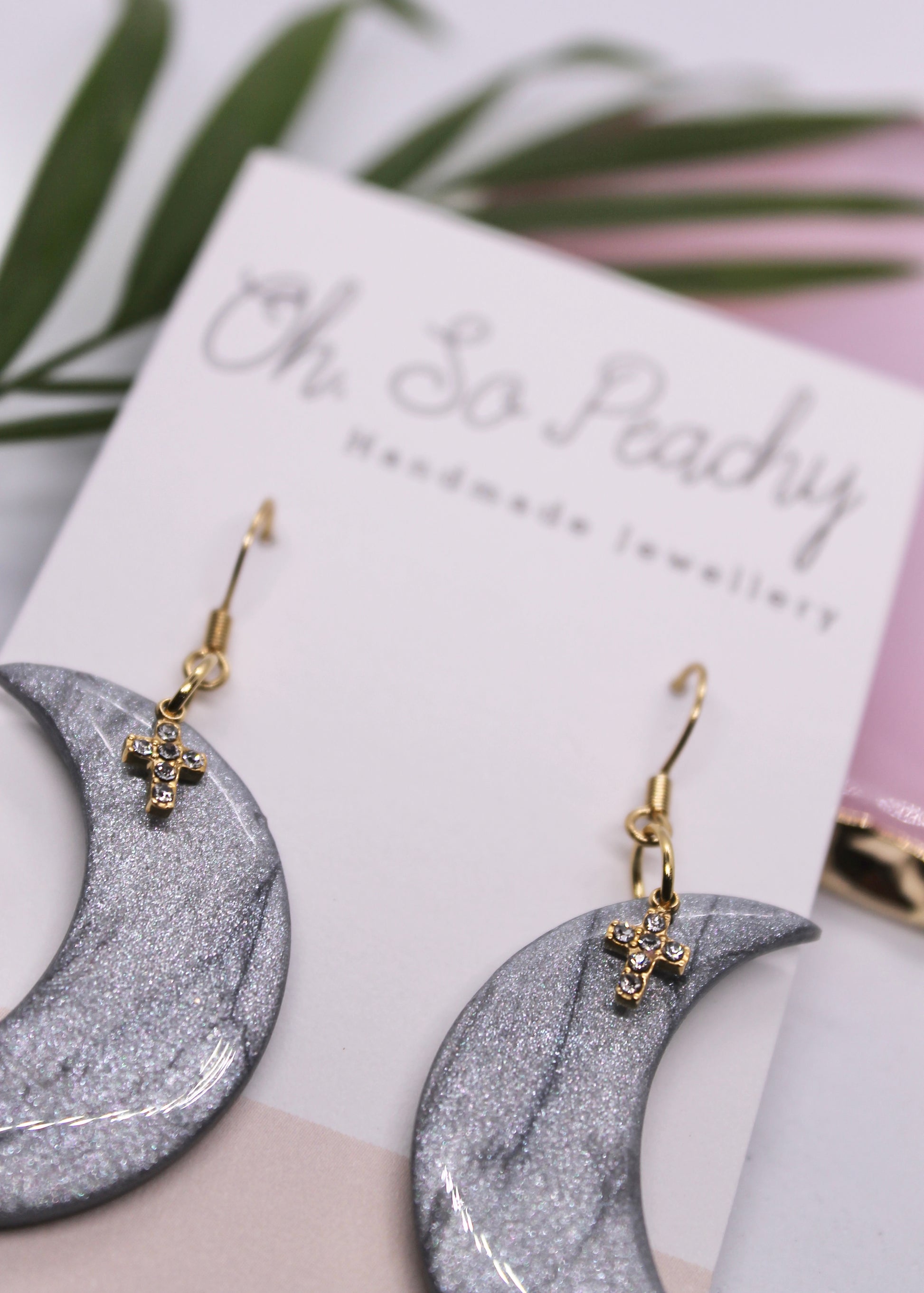 Polymer Clay Silver Moon Hook Earrings With Cross Charms Close Up