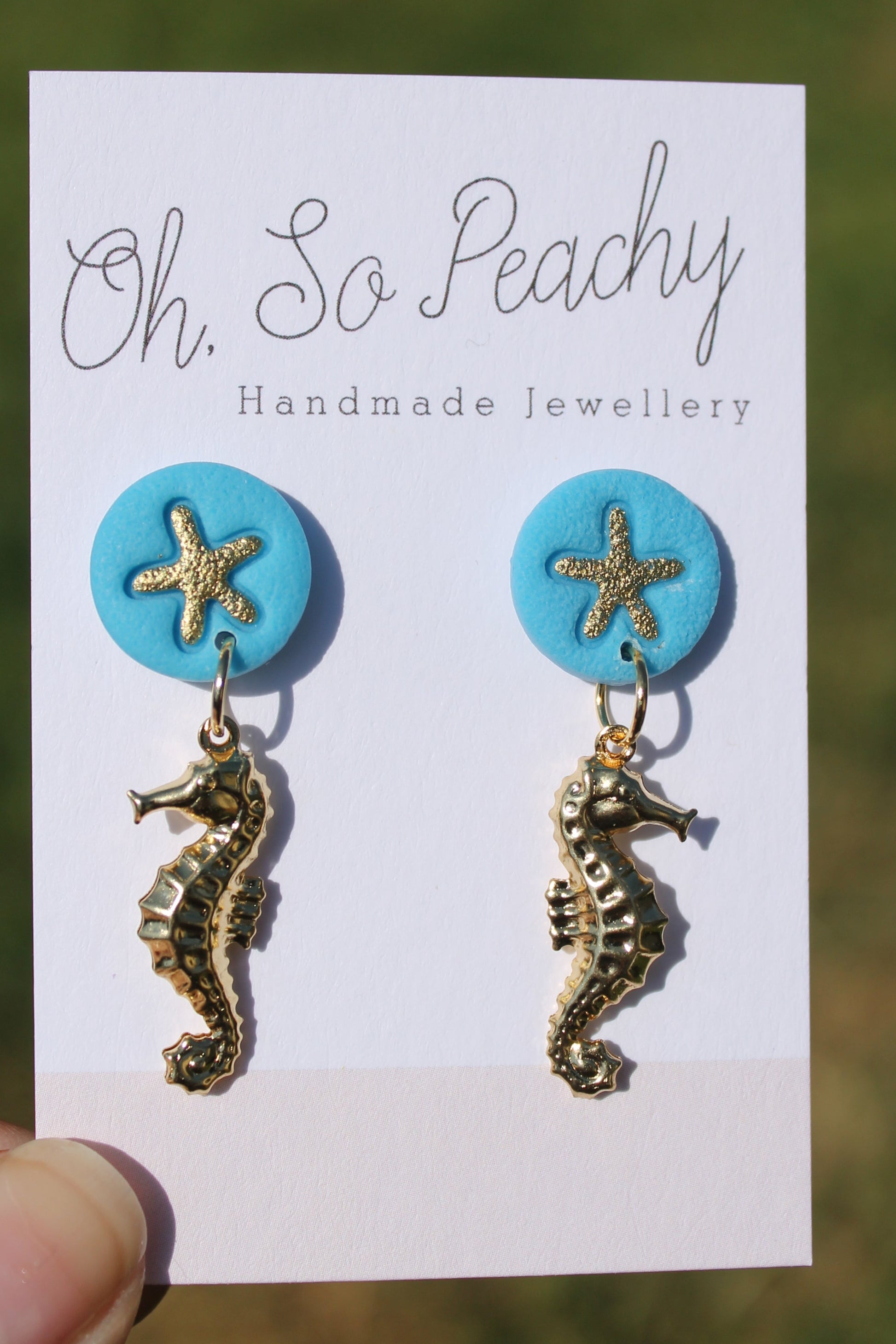 Polymer Clay Starfish Stud Earrings With A Gold Seahorse Charm Blue