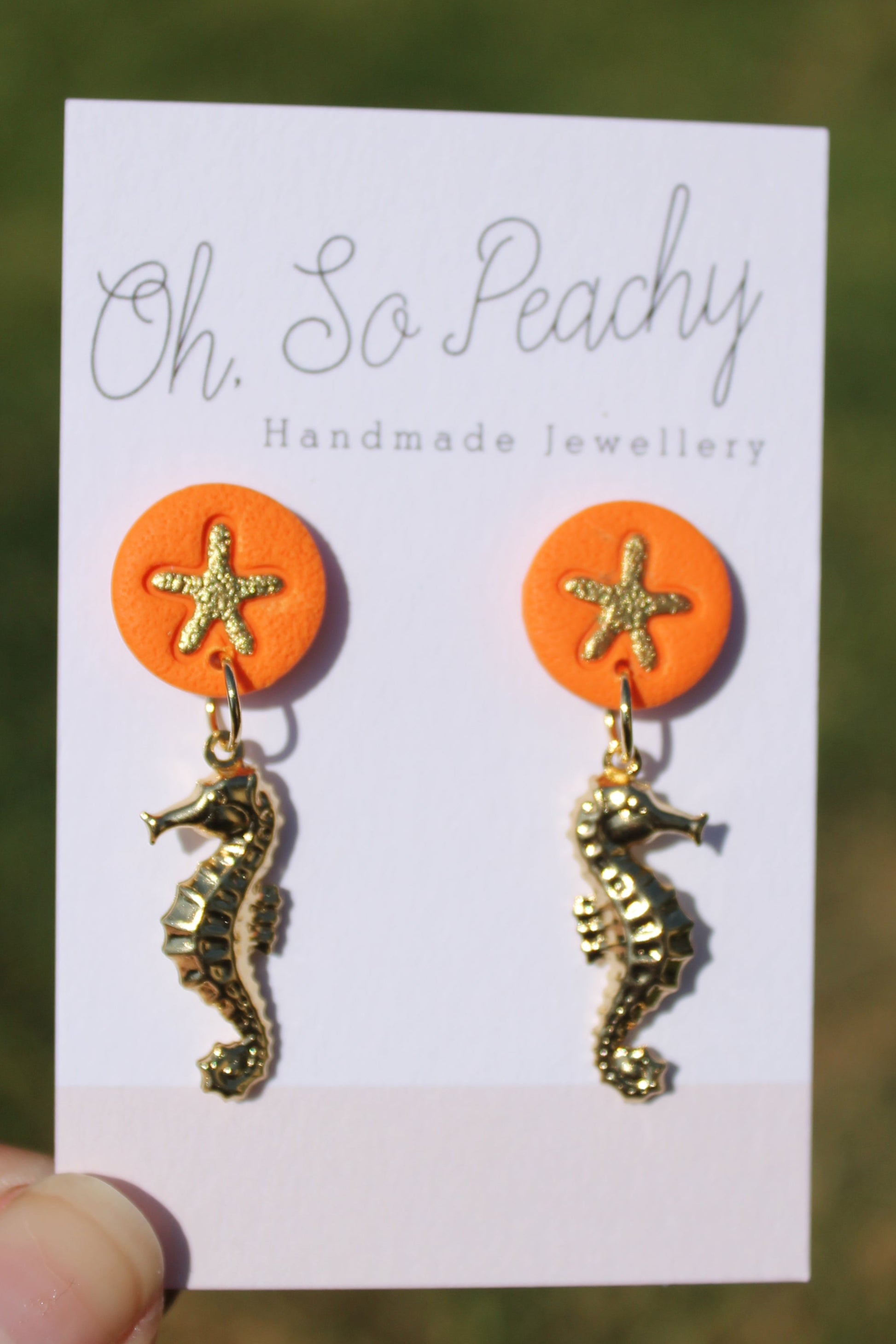 Polymer Clay Starfish Stud Earrings With A Gold Seahorse Charm Orange